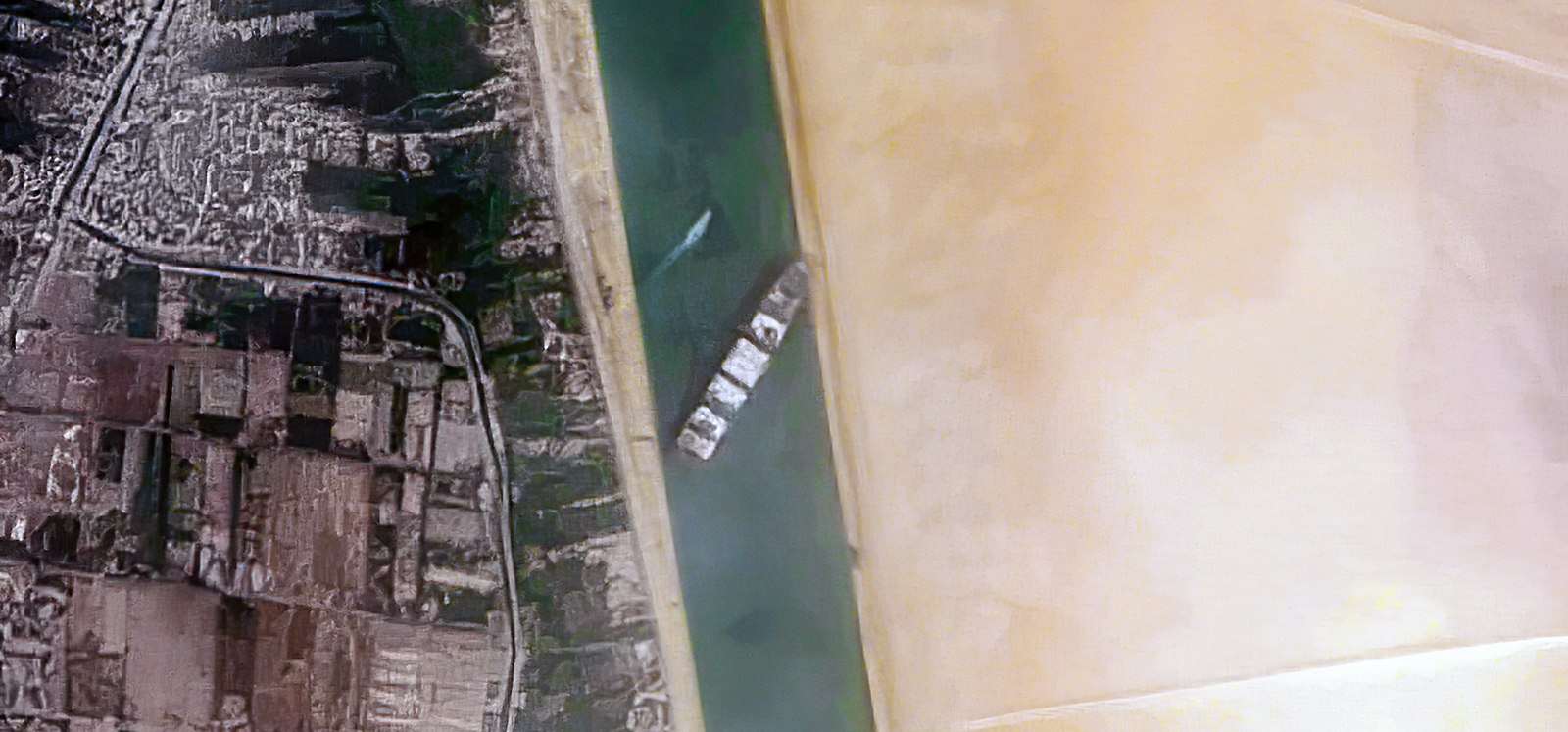 Container_Ship_Ever_Given_stuck_in_the_Suez_Canal,_Egypt_-_March_24th,_2021_(51070311183)